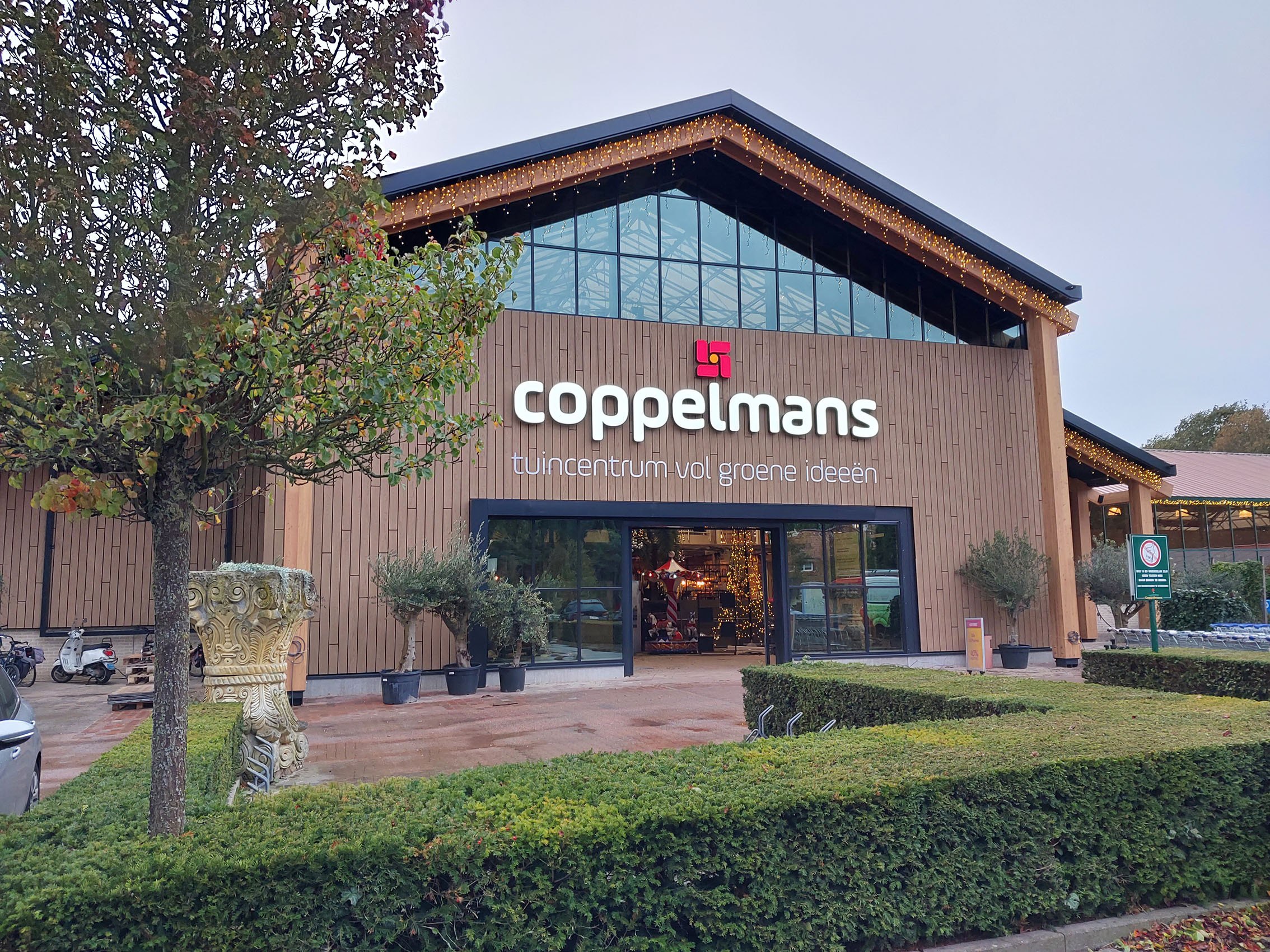 Wood-clad garden centre facade
